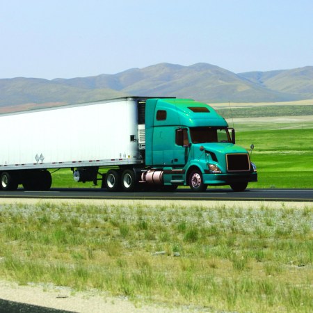 Semi truck traveling done the road